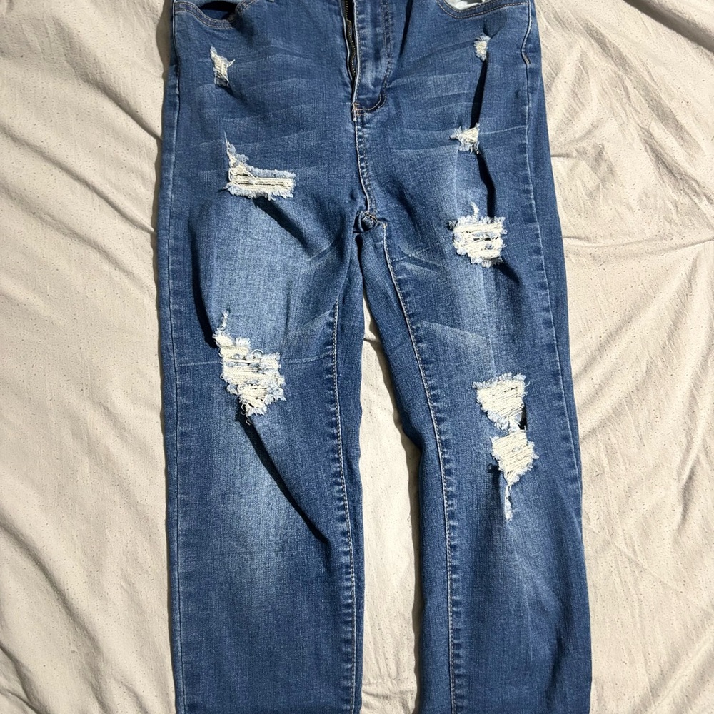 Distressed Blue Denim Jeans